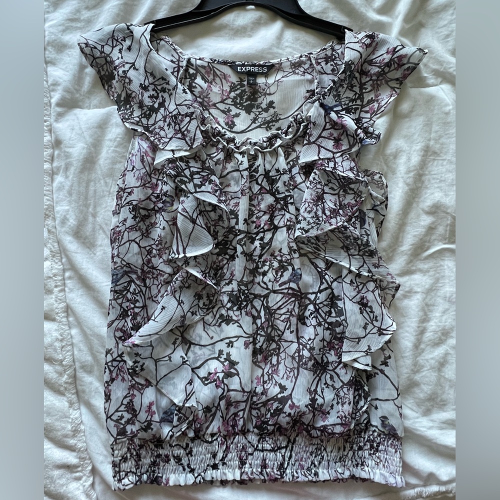 Express sleeveless blouse with ruffles and smocked detail